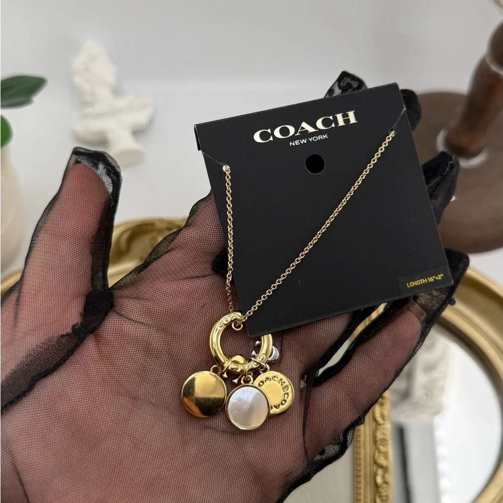 COACH New York Gold Charm Pendant Necklace – NWT - Picture 6 of 7